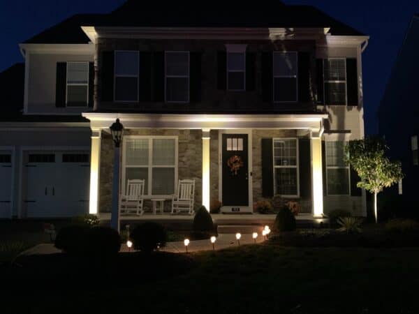 front porch with outdoor lighting